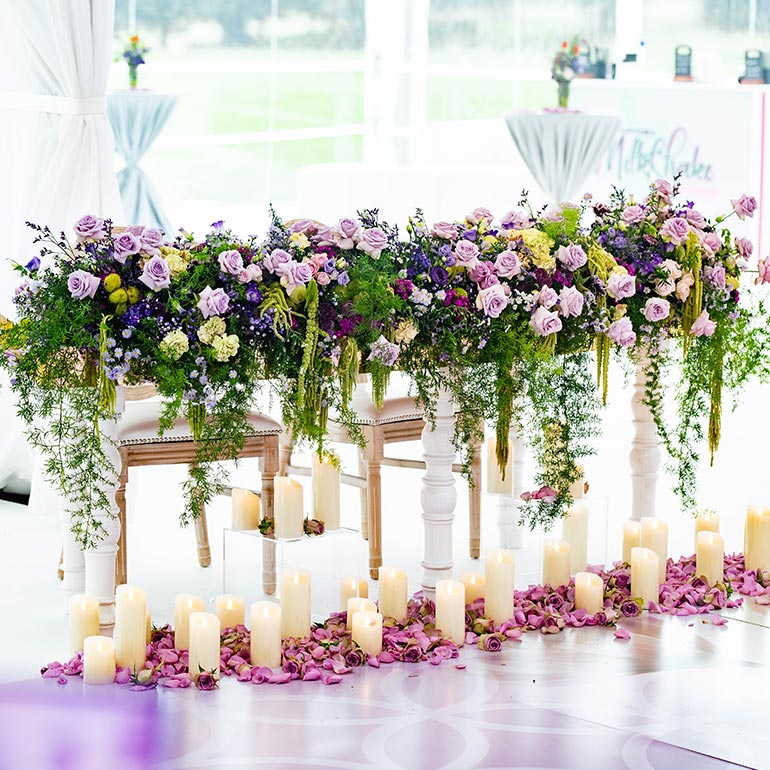 Wedding top table with flowers