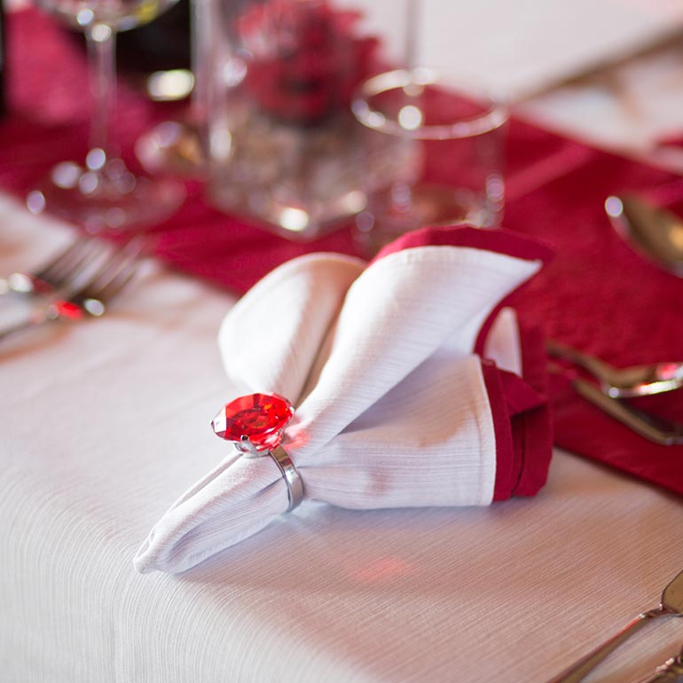 Red and white napkin on a table